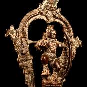 Ancienne statuette en bronze du dieu Krishna dansant sur le serpent Kaliya
